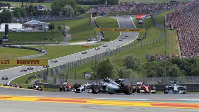 Mercedes F1 driver Nico Rosberg, centre, drives during the Austrian Grand Prix on Sunday. Bernadett Szabo / Reuters
