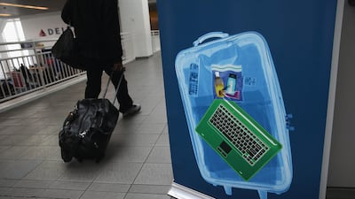 Australia said it is considering following the US and Britain with a laptop ban on inbound flights. John Moore / AFP