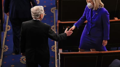 Republican Senator Mitch McConnell greets Congresswoman Liz Cheney before US President Joe Biden's address to a joint session of Congress last week. (AFP)