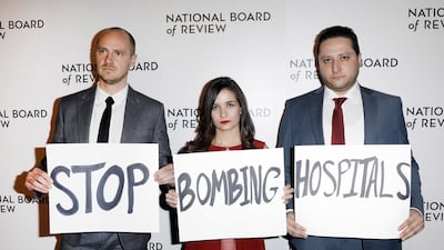 (L-R) Edward Watts, Waad Al Kateab and Hamza Al Kateab attend The National Board of Review Annual Awards Gala in New York, New York, 08 January 2020. Peter Foley/ EPA