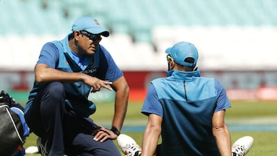 Sources inside the BCCI say Anil Kumble, left, will continue as India's coach through next month's tour of the West Indies. John Sibley/ Reuters