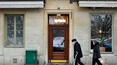 Pedestrians wearing protective face masks in Stockholm, Sweden. Bloomberg