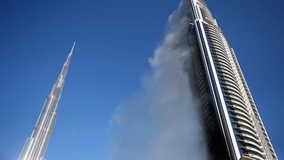 A man is accused in court of impersonating a fireman during the Address Downtown Dubai hotel blaze on New Year's Eve. Francois Nel / Getty Images