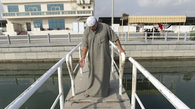 Rashid Al Oubad says poor maintenance at Al Rugaylat Fishermen’s Port is leading to accidents. Reem Mohammed / The National