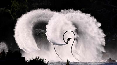 Participants use water jet packs on the Yarra river during the annual Moomba Festival in Melbourne. AFP