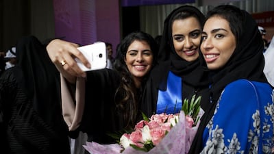 Celebrating graduates take a selfie during the Masdar Institute ceremony. Christopher Pike / The National