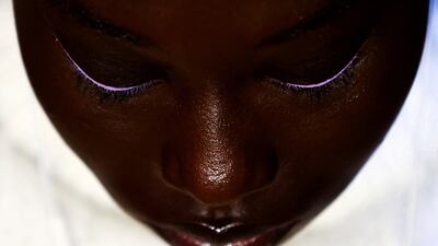 A model backstage during the Carolina Herrera Fall/Winter 2023 collection show at New York Fashion Week. Reuters