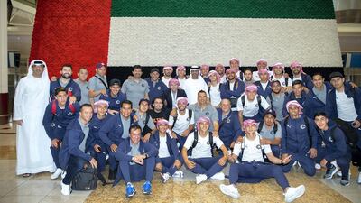 The Guadalajara squad poses for photos in front of a giant UAE flag ahead of the Fifa Club World Cup. Courtesy Fifa Club World Cup UAE 2018