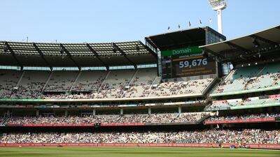 The scoreboard at the MCG shows the crowd attendance on Friday. Getty Images