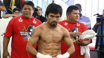 Boxer Manny Pacquiao poses after working out ahead of his bout with Tim Bradley, in Hollywood, Los Angeles, California, United States, March 30, 2016. Lucy Nicholson / Reuters