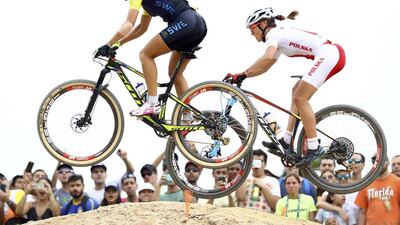 Jenny Rissveds of Sweden and Maja Wloszczowska of Poland compete during the women’s mountain bike race at the Rio 2016 Olympic Games on August 20, 2016 in Rio de Janeiro, Brazil. Paul Hanna / Reuters