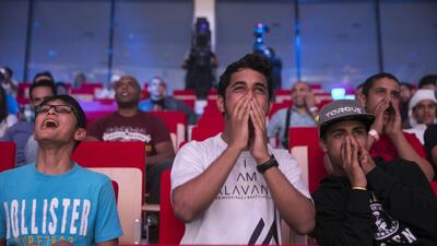 Fans enjoying Abu Dhabi Warriors Fighting Championship at the IPIC Arena in Zayed Sports City. Silvia Razgova / The National