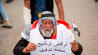 An Iraqi man takes part in an anti-government protest in the southern city of Basra. AFP