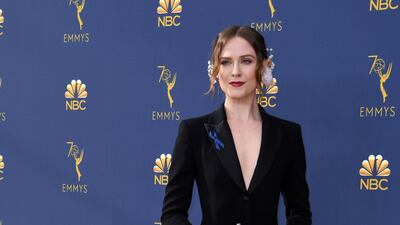 Evan Rachel Wood is striking in Altuzarra - the flowers in her hair adding a dose of whimsy. Photo / AFP