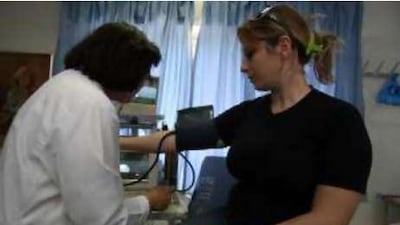 Dr Sawsan Nahawi performs a routine medical check at a family planning centre in Amman.