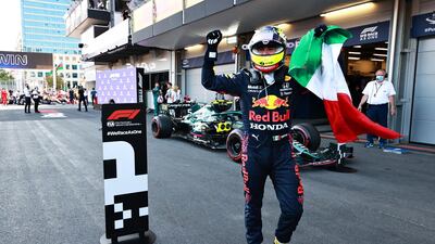 Rud Bull driver Sergio Perez celebrates after winning the Azerbaijan Grand Prix in Baku on Sunday, June 6. Getty