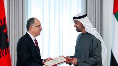 Bajram Begaj, President of Albania, presents the Grand Star of the Supreme Order of the Eagle to President Sheikh Mohamed. Photo: UAE Presidential Court