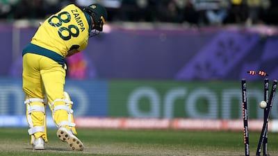 Australia's Adam Zampa is clean bowled by New Zealand's Trent Boult. AFP
