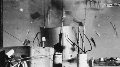 A Titan 1 Booster Missile body is blown apart by a high-powered laser during a test in New Mexico on September 6, 1985, conducted under President Reagan's Star Wars program. AP Photo