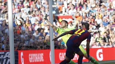 Barcelona's Neymar heads in their second goal on Saturday in the 2-0 La Liga victory over Real Sociedad at the Camp Nou. Gustau Nacarino / Reuters