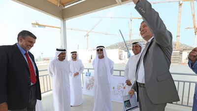 Abu Dhabi Tourism Development & Investment Company hosted Sheikh Nahyan bin Mubarak Al Nahyan, Minister of Culture, Youth and Community Development, on a tour of the Louvre Abu Dhabi's construction site. Courtesy TDIC