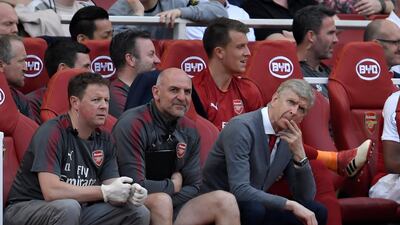 Arsenal manager Arsene Wenger and assistant manager Steve Bould on the bench. Toby Melville / Reuters