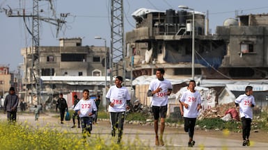 The Zayed Marathon under way in the central Gaza Strip on Saturday. AFP
