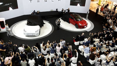 Tesla's Model Y and Model 3 vehicles at an official launch in Thailand in December. EPA