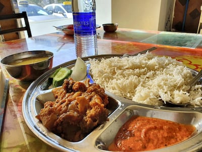 Chicken, chutney and rice at Tasty Zone Cafeteria in Abu Dhabi. Photo: Rob McKenzie for The National