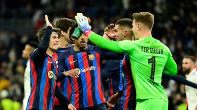 Barcelona players celebrate at the end of the Copa del Rey semi-final first leg against Real Madrid at the Santiago Bernabeu on March 2, 2023. Barca won 1-0. AFP
