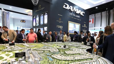 Visitors crowd the Damac stand at Cityscape Global in Dubai. Pawan Singh / The National