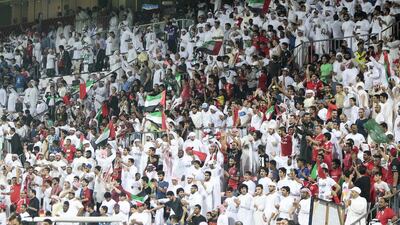 Fans cheer for Al Ahli during the Asian Champions League semi-final second leg in Dubai at the Rashid Stadium. Jeffrey E Biteng / The National / October 20, 2015