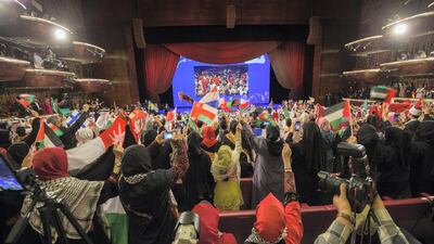 The crowd cheer on the participants. Leslie Pableo for The National