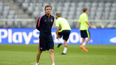 Luis Enrique leads a team training session on Monday ahead of Barcelona's Champions League semi-final return leg against Bayern Munich on Tuesday. Andreas Gebert / EPA / May 11, 2015