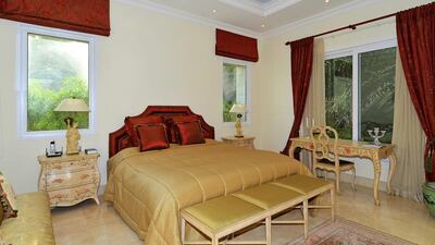 Plenty of greenery surrounds this bedroom. Courtesy Better Homes
