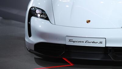 The all-electric Porsche AG Taycan luxury automobile is unveiled at Berlin-Neuhardenberg airport. Bloomberg