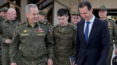 Russia has a large military presence in Syria to bolster Mr Al Assad, right, in the continuing civil war. EPA