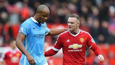 Neither Vincent Kompany of Manchester City nor Wayne Rooney of Manchester united is expected to play in the derby on Sunday. Michael Regan / Getty Images