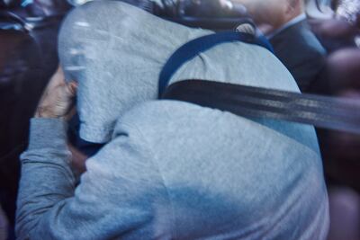 A suspect is transported by Australian police in Surry Hills, Sydney. Aaron Bunch / EPA