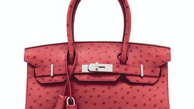 A rouge Vif Ostrich Birkin 30 with palladium hardware. Estimate: £15,000 - 20,000. Courtesy Christie's
