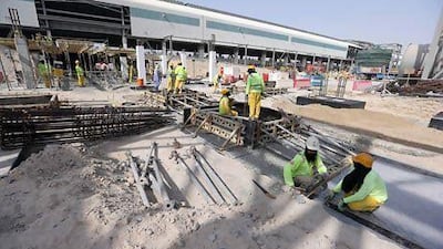 Emal this month merged with Dubai Aluminium to create Emirates Global Aluminium, a company owned in equal parts by Abu Dhabi and Dubai. Sammy Dallal / The National