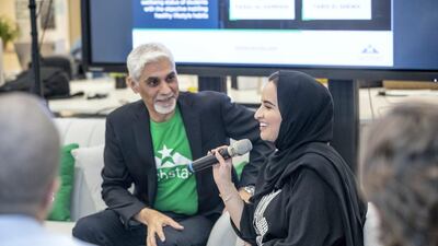 Vijay Tirathrai, managing director of Techstars Dubai, and Maha Al Mezaina, head of Area 2071, announce which 10 companies won funding for their innovative ideas. Antonie Robertson / The National