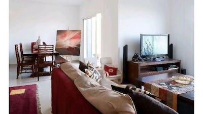 The open-plan living and dining space suits the family's lifestyle.