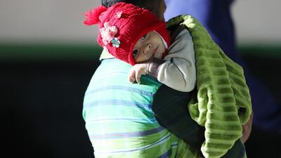 People arrive at the beach in Al Hamra, Ras Al Khaimah. Chris Whiteoak / The National