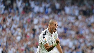 Pepe of Real Madrid celebrates scoring his team's second goal in their La Liga victory over Barcelona on Saturday. Denis Doyle / Getty Images