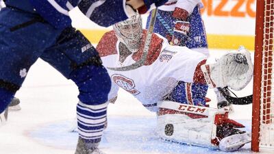 Montreal Canadiens goalie Carey Price makes a pad save against the Toronto Maple Leafs in his team's opening night NHL victory on Wednesday. Frank Gunn / The Canadian Press / AP / October 7, 2015