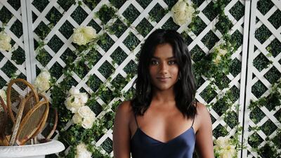 Simone Ashley of 'Bridgerton' in a midnight blue Ralph Lauren slip dress. WireImage