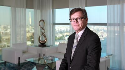 Shayne Nelson, chief executive of Emirates NBD, said tje bank delivered a half-yearly net profit in excess of Dh5bn for the first time in its history. Victor Besa for The National