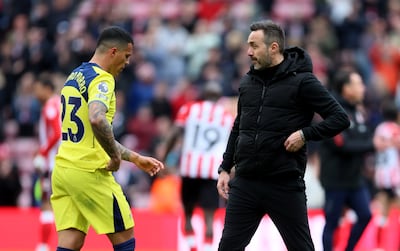 Tottenham Hotspur's Pedro Porro with manager Roberto De Zerbi. PA