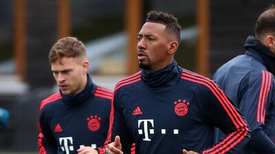 File photo of Bayern Munich's Jerome Boateng and Joshua Kimmich during training. Reuters
